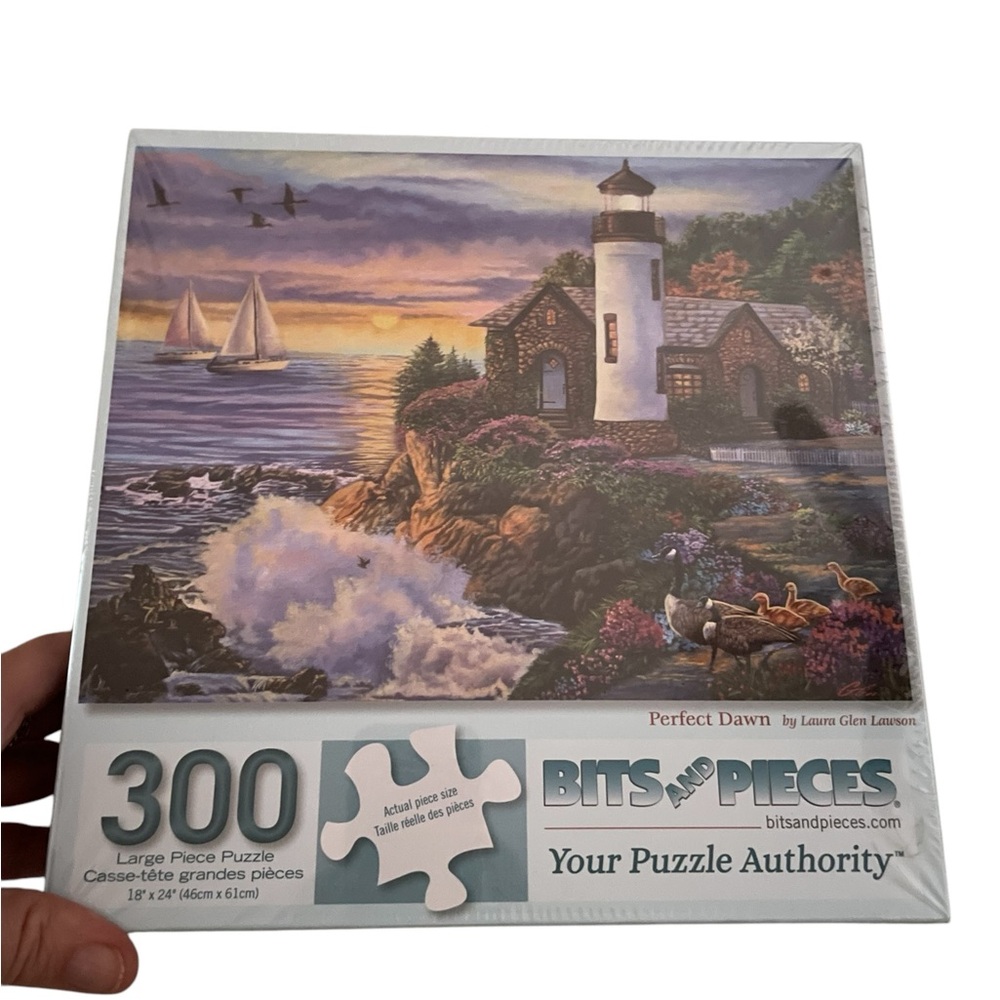 New Bits and Pieces 300 piece Puzzle. Lighthouse “Perfect Dawn”